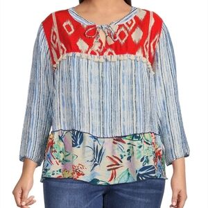 Colorful Women's Top with Red and Blue Patterns